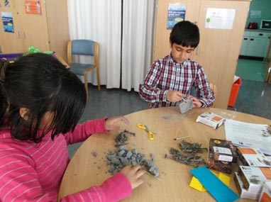 Children at Birmingham Children's Hospital learn about their bones by studying dinosaurs.