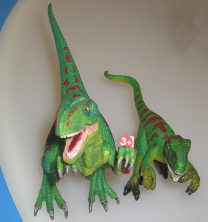 Comparing two Schleich Velociraptor dinosaur models.