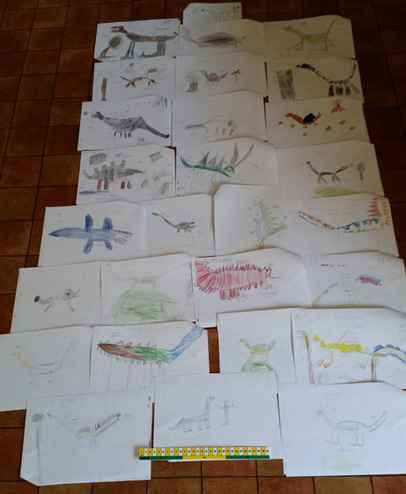 A selection of prehistoric animal designs by a Year 2 class at Great Wood Primary.