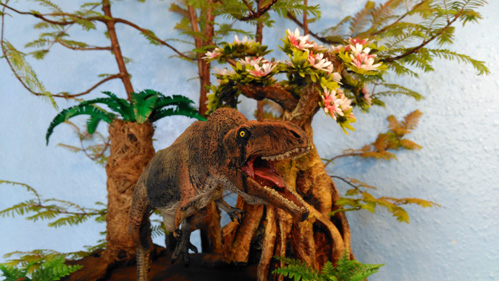 A fearsome Giganotosaurus dinosaur diorama.