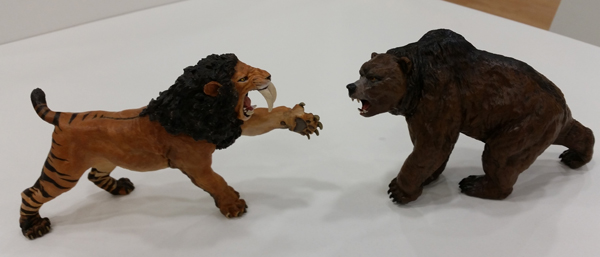Papo Sabre-Tooth Cat model and Cave Bear