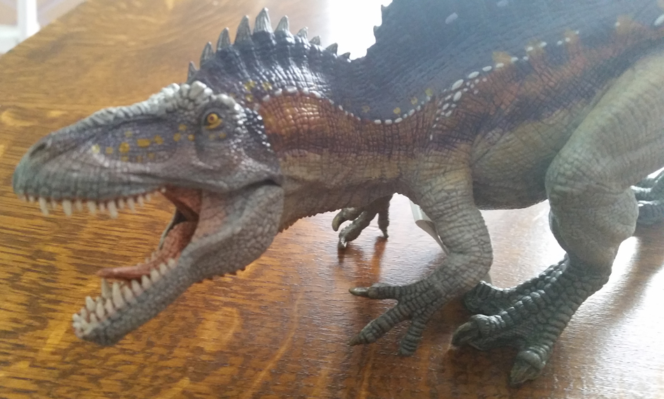A view of the Papo Acrocanthosaurus dinosaur model.