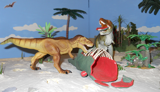 Two Tyrannosaurs feeding on the carcass of a Titanosaur.