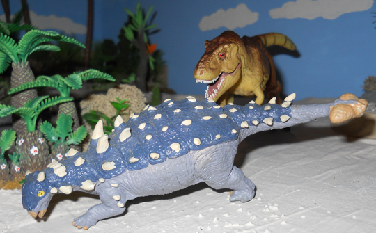 T. rex and Euoplocephalus confrontation.