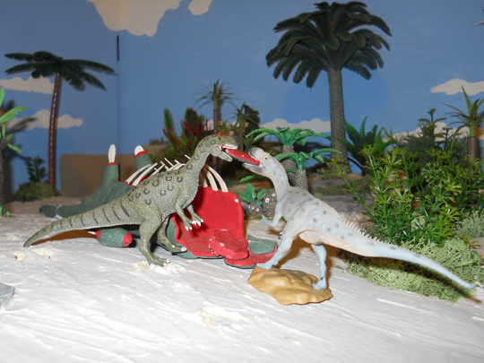 Battling over a carcass the Collecta Lourinhanosaurus versus the CollectA Metriacanthosaurus.