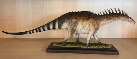 A customised Wild Safari Prehistoric World Amargasaurus dinosaur model.