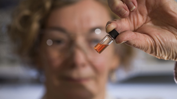 A vial of pink pigments porphyrins - representing the oldest intact pigments in the world.