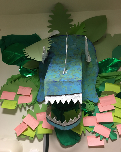 Triceratops head on display in a Key Stage 1 classroom.