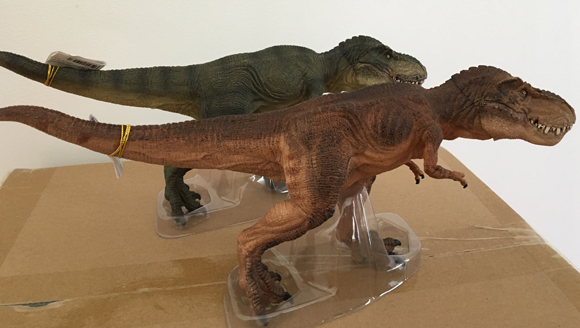 The brown and green running T. rex figures from Papo.