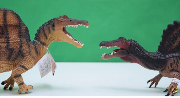 Comparing two Spinosaurus dinosaur models.