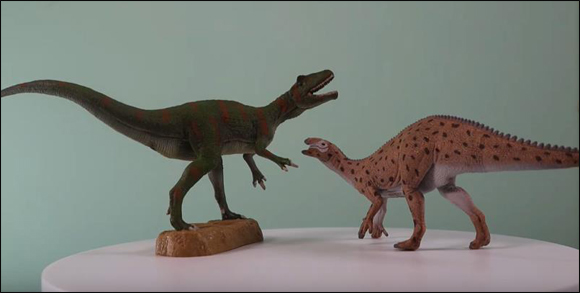 Two CollectA dinosaur models on display.