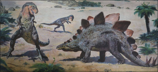 Stegosaurus stenops threatened by a pair of Antrodemus valens.