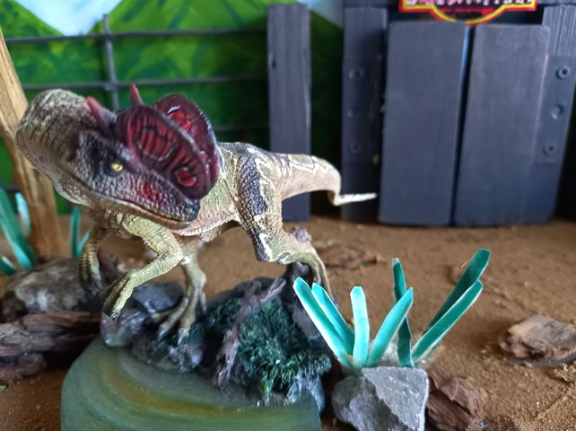 ITOY Studio Dilophosaurus in a Jurassic Park diorama.