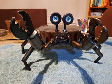Metallic crab sculpture